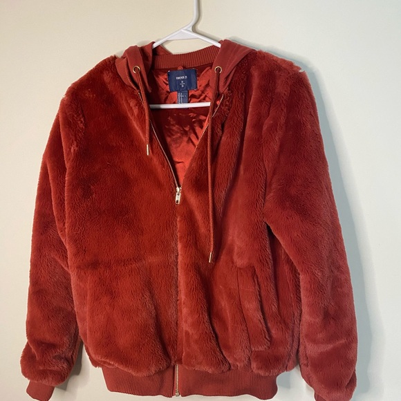 red fluffy jacket